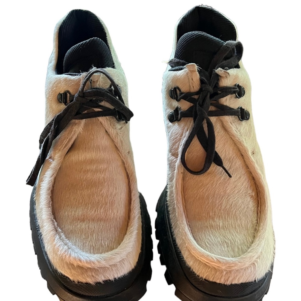 Magnificent pair of never worn Prada pony hiking boots shoes.  Size 9